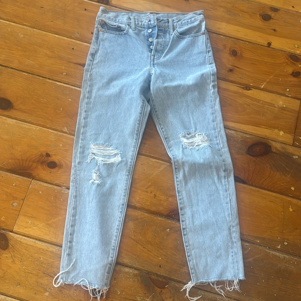 Levis light wash denim jeans.